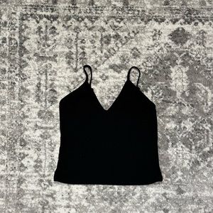 Black ribbed knit tank top. Size M.